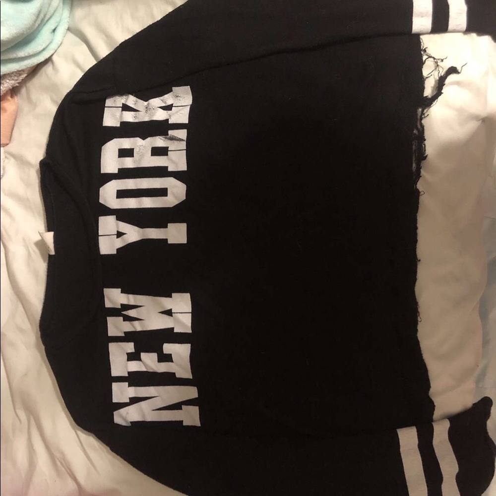 white and black new york sweater